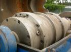 Used Alfa Laval NX-309S-31G Solid Bowl Decanter Centrifuge. Max bowl speed 5600 RPM, stainless steel construction on product contact areas, single lead conveyor, single row of cake discharge ports, b...