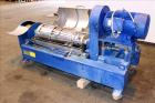 Used Alfa Laval NX-414B-31 Solid Bowl Decanter Centrifuge, 316 stainless steel (product contact areas). Max bowl speed 4000 rpm, single row of cake solids discharge ports, 2.75