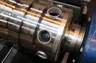 Used Alfa Laval NX-414B-31 Solid Bowl Decanter Centrifuge, 316 stainless steel (product contact areas). Max bowl speed 4000 rpm, single row of cake solids discharge ports, 2.75