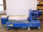 Used Alfa Laval NX-414B-31 Solid Bowl Decanter Centrifuge, 316 stainless steel (product contact areas). Max bowl speed 4000 rpm, single row of cake solids discharge ports, 2.75