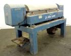 Used Alfa Laval UVNX-418 (2 or 3 phase) Solid Bowl Decanter Centrifuge. 316 Stainless steel (product contact areas). single lead conveyor, single row of lined cake discharge ports,cake discharge cage...