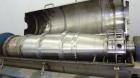Used Alfa Laval UVNX-418 (2 or 3 phase) Solid Bowl Decanter Centrifuge. 316 Stainless steel (product contact areas). single lead conveyor, single row of lined cake discharge ports,cake discharge cage...