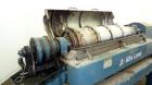 Used Alfa Laval UVNX-418 (2 or 3 phase) Solid Bowl Decanter Centrifuge. 316 Stainless steel (product contact areas). single lead conveyor, single row of lined cake discharge ports,cake discharge cage...