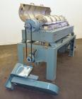 Used Alfa Laval UVNX-418 (2 or 3 phase) Solid Bowl Decanter Centrifuge. 316 Stainless steel (product contact areas). single lead conveyor, single row of lined cake discharge ports,  cake discharge ca...