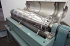 Used Alfa Laval UVNX-418 (2 or 3 phase) Solid Bowl Decanter Centrifuge. 316 Stainless steel (product contact areas). single lead conveyor, single row of lined cake discharge ports,  cake discharge ca...