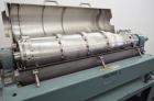 Used Alfa Laval UVNX-418 (2 or 3 phase) Solid Bowl Decanter Centrifuge. 316 Stainless steel (product contact areas). single lead conveyor, single row of lined cake discharge ports,  cake discharge ca...