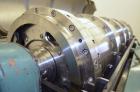 Used Alfa Laval UVNX-418 (2 or 3 phase) Solid Bowl Decanter Centrifuge. 316 Stainless steel (product contact areas). single lead conveyor, single row of lined cake discharge ports,  cake discharge ca...