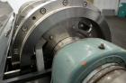 Used Alfa Laval UVNX-418 (2 or 3 phase) Solid Bowl Decanter Centrifuge. 316 Stainless steel (product contact areas). single lead conveyor, single row of lined cake discharge ports,  cake discharge ca...