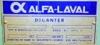Used Alfa Laval UVNX-418 (2 or 3 phase) Solid Bowl Decanter Centrifuge. 316 Stainless steel (product contact areas). single lead conveyor, single row of lined cake discharge ports,  cake discharge ca...