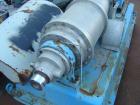 USED: Dorr-Oliver 12L solid bowl decanter centrifuge, 316 stainless steel. Max bowl speed 5500 rpm, 8 deg contour bowl, centripetal pump on liquid discharge, cake discharge race track, external pool ...