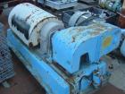 USED: Dorr-Oliver 12L solid bowl decanter centrifuge, 316 stainless steel. Max bowl speed 5500 rpm, 8 deg contour bowl, centripetal pump on liquid discharge, cake discharge race track, external pool ...