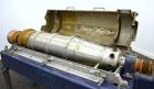 Used Alfa Laval NX-418 (2 or 3 phase) Solid Bowl Decanter Centrifuge. 316 Stainless steel construction (product contact areas), maximum bowl speed 3250 rpm, single row of lined cake discharge ports, ...