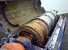 Used Alfa Laval NX-418 (2 or 3 phase) Solid Bowl Decanter Centrifuge. 316 Stainless steel construction (product contact areas), maximum bowl speed 3250 rpm, single row of lined cake discharge ports, ...