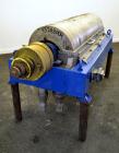 Used Alfa Laval NX-418 (2 or 3 phase) Solid Bowl Decanter Centrifuge. 316 Stainless steel construction (product contact areas), maximum bowl speed 3250 rpm, single row of lined cake discharge ports, ...