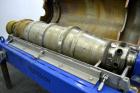 Used Alfa Laval NX-418 (2 or 3 phase) Solid Bowl Decanter Centrifuge. 316 Stainless steel construction (product contact areas), maximum bowl speed 3250 rpm, single row of lined cake discharge ports, ...