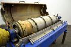 Used Alfa Laval NX-418 (2 or 3 phase) Solid Bowl Decanter Centrifuge. 316 Stainless steel construction (product contact areas), maximum bowl speed 3250 rpm, single row of lined cake discharge ports, ...