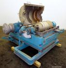 Used Sharples P-3000 Super-D-Canter Centrifuge. 316 Stainless steel construction (product contact areas), maximum bowl speed 3150 rpm, hogged- out cake discharge ports with replaceable wear liners, c...