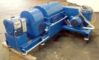 Used Sharples PM-20000 Super-D-Canter Centrifuge. 316 Stainless steel construction (product contact areas), maximum bowl speed 3250 rpm, discharge ports with wear liners, 4.25