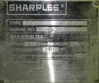 Used Sharples PM-35000 (Type RR-392) Super-D-Canter Centrifuge System. Driven by a 30 HP, 3/60/460 Volt, 1755 RPM motor. 10 HP backdrive motor. Includes a control panel with an Allen Bradley Panelvie...