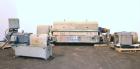 Used Sharples PM-75000 Super-D-Canter Centrifuge. 316/317 Stainless steel construction on product contact areas. Maximum bowl speed 2600 rpm, 360 degree solid discharge ports with STC liners, 10
