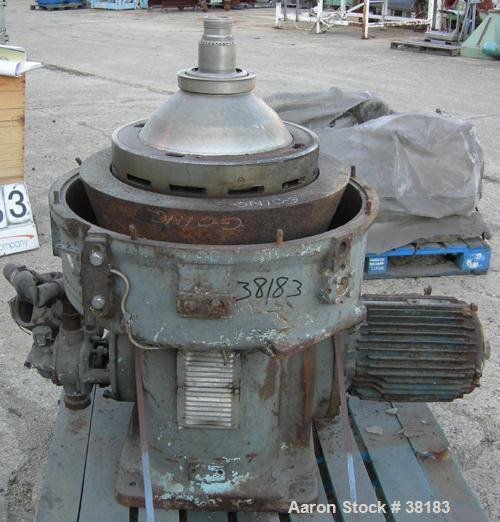 USED: Alfa-Laval AFPX-309-14B desludger centrifuge, 316 stainless steel, separator top feed. Driven by a 30 kw, 3/50 direct drive motor. Mounted on a carbon steel base.