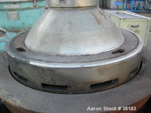 USED: Alfa-Laval AFPX-309-14B desludger centrifuge, 316 stainless steel, separator top feed. Driven by a 30 kw, 3/50 direct drive motor. Mounted on a carbon steel base.