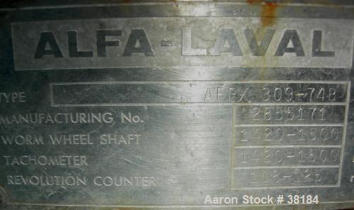 USED: Alfa-Laval AFPX-309-74B desludger centrifuge, 316 stainless steel, separator top feed. Driven by a 30 kw, 3/50/400/440 volt, 1445 rpm direct drive motor. Mounted on a carbon steel base.