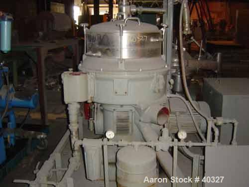 USED: Alfa-Laval AFPX-309B-74-60 desludger centrifuge, 316 SS,separator design, top feed, 15 hp 220/440/3/60, direct drive, skidmounted, controls.
