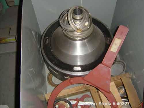 USED: Alfa-Laval AFPX-309B-74-60 desludger centrifuge, 316 SS,separator design, top feed, 15 hp 220/440/3/60, direct drive, skidmounted, controls.