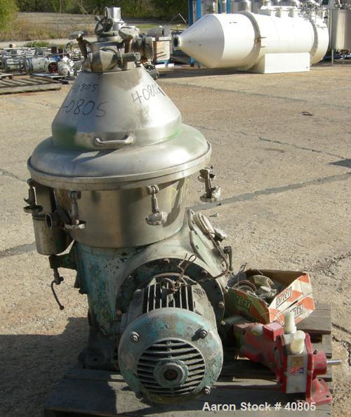USED: Alfa-Laval brpx-309-34s desludger, two phase clarifier in stainless construction, flange mtd motor, 11 kw, 3/50/380, inlet & discharge piping.