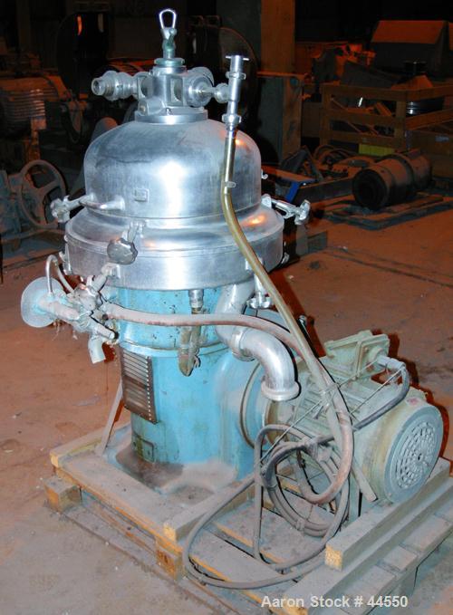USED: Alfa Laval desludger disc centrifuge, model BRPX207-SGV-34.  316 stainless steel on product contact areas, clarifier design. Water harness, approx 7.5 hp motor (no tag), mounted on a sub-base.