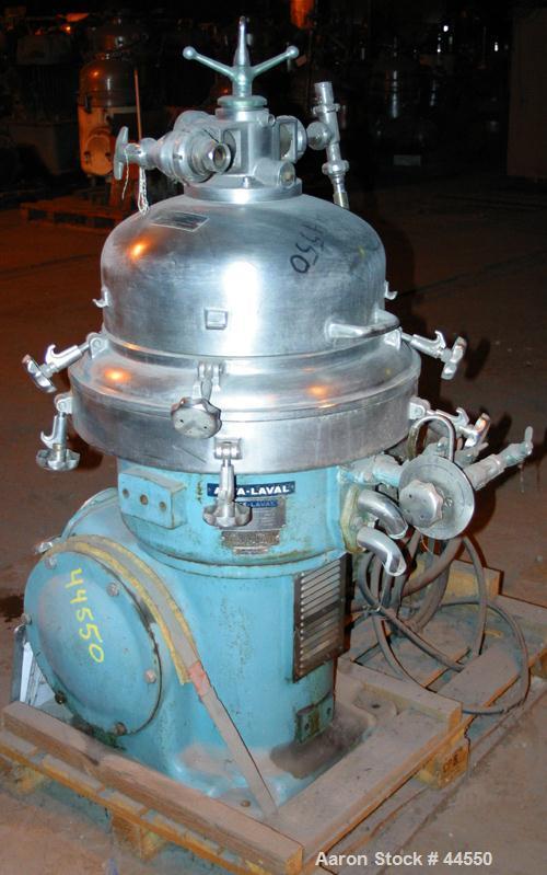 USED: Alfa Laval desludger disc centrifuge, model BRPX207-SGV-34.  316 stainless steel on product contact areas, clarifier design. Water harness, approx 7.5 hp motor (no tag), mounted on a sub-base.