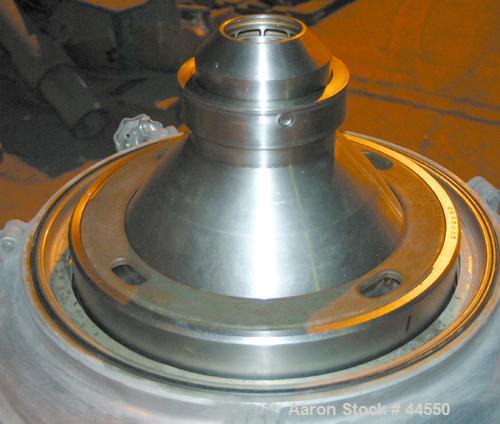 USED: Alfa Laval desludger disc centrifuge, model BRPX207-SGV-34.  316 stainless steel on product contact areas, clarifier design. Water harness, approx 7.5 hp motor (no tag), mounted on a sub-base.