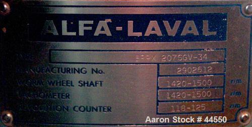 USED: Alfa Laval desludger disc centrifuge, model BRPX207-SGV-34.  316 stainless steel on product contact areas, clarifier design. Water harness, approx 7.5 hp motor (no tag), mounted on a sub-base.