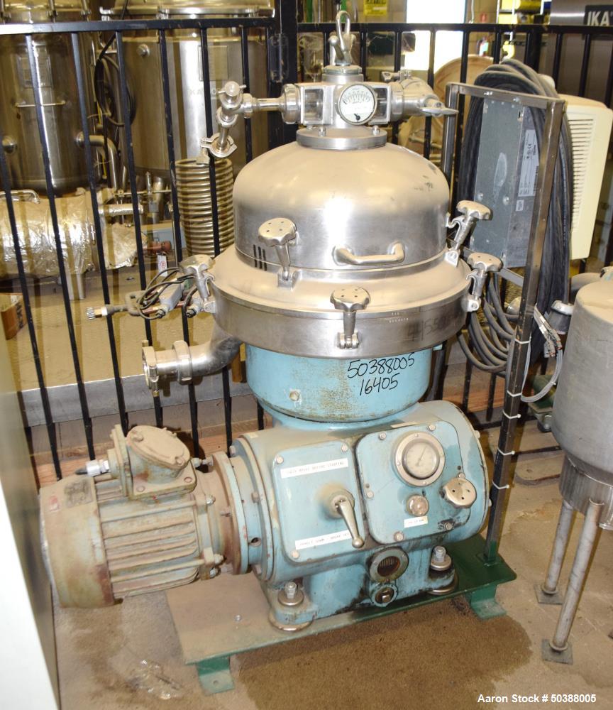 Used Alfa Laval Desludger Disc Centrifuge, Model BRPX207-SGV-34. 316 Stainless steel on product contact areas, clarifier design. Water harness, 7.5 hp motor, sludge tank, and control panel. Mounted o...