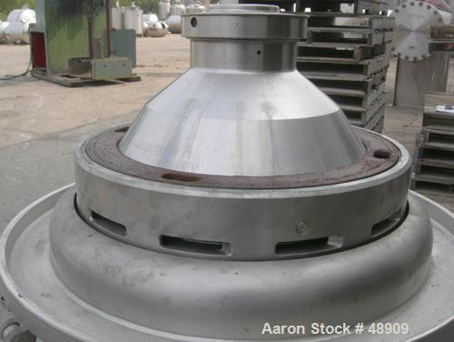 USED: Alfa Laval BRPX-309-34S Desludger Disc Centrifuge. Material of construction is 316 stainless steel, clarifier design, top feeding. Direct driven with 16.5 hp (11 kw) 3/50/220/380 volt, 1455 rpm...
