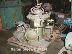 Used Alfa Laval CAFPX-207-XGV-19-60 Disc Centrifuge, 316 Stainless Steel. Light phase pump discharge, heavy phase overflow, outer rising channel. Driven by a 10 HP, 3/60/230/460 Volt, 1750 RPM Motor.