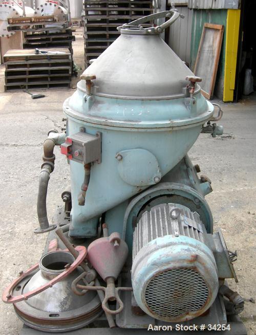 Used Alfa-Laval MAPX-210T-29-60 Oil Purifier Centrifuge Frame, 329 Stainless Steel. Frame driven feed pump, 25 hp motor 208/3/60, 1760 rpm tefc.
