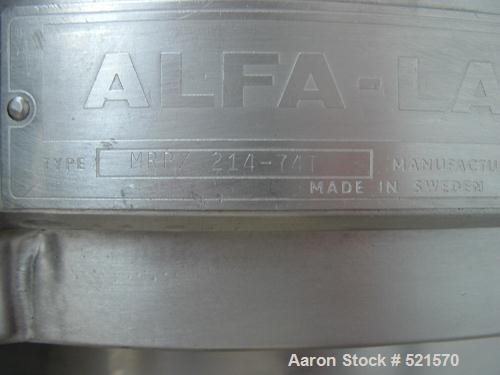 USED: Alfa Laval MRPX-214-TGC desludger disc centrifuge, stainless steel construction on product contact areas. Clarifier design, centripetal pump liquid discharge, direct drive configuration, approx...