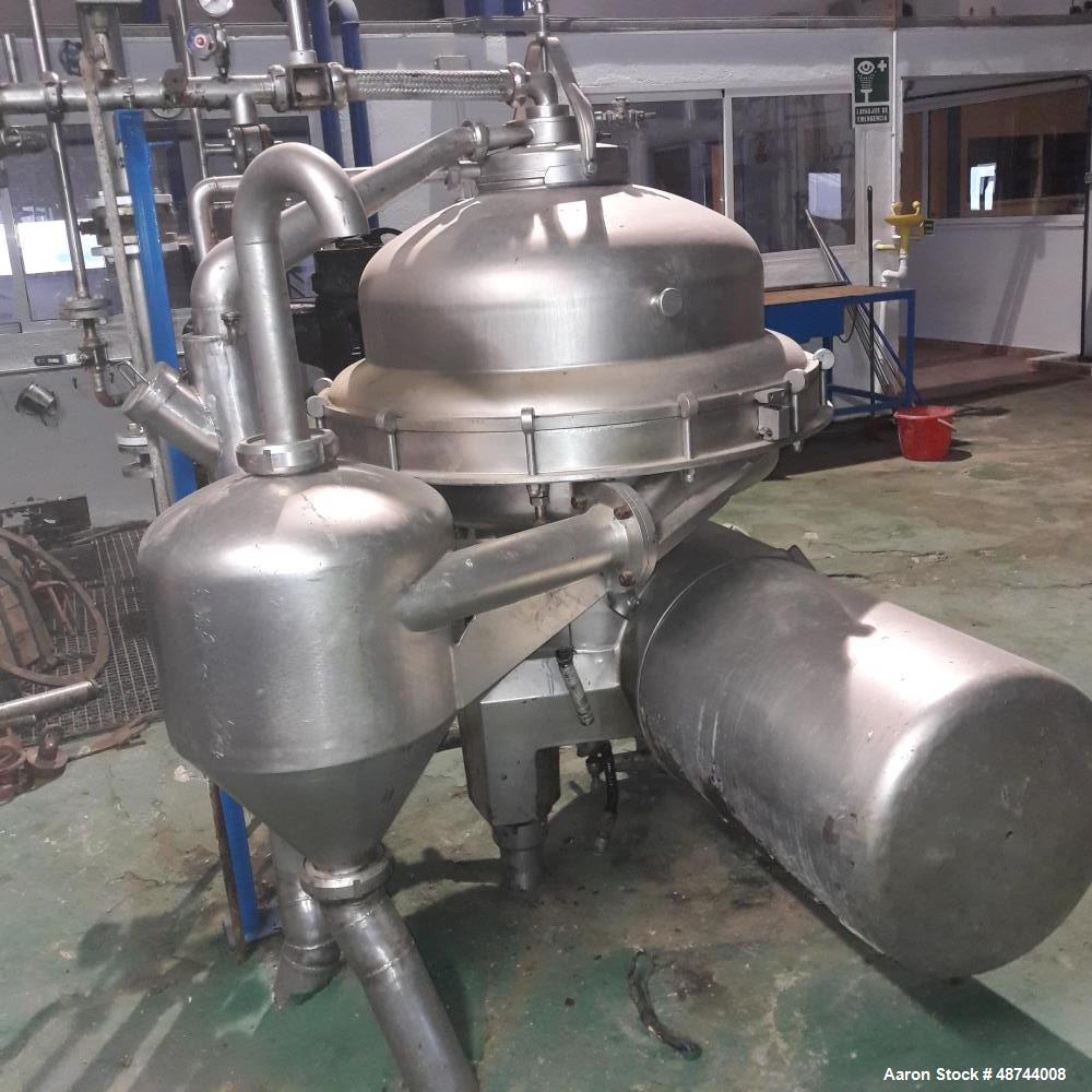 Used Alfa Laval SRPX-417 HGV-14CH Desludger Disc Centrifuge. 316 Stainless steel construction (product contact areas), separator design liquid/liquid/solids. Bottom feed design, flange drive motor, 1...