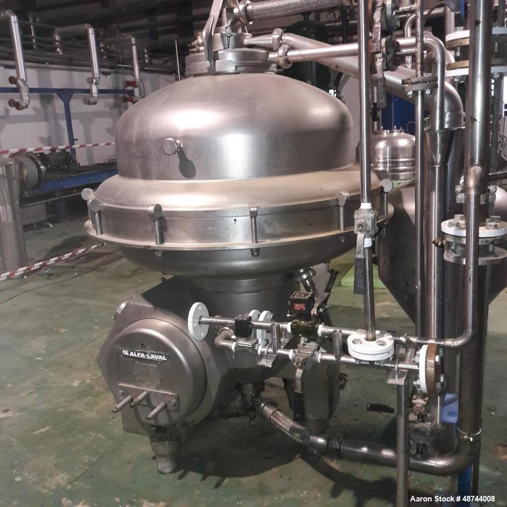 Used Alfa Laval SRPX-417 HGV-14CH Desludger Disc Centrifuge. 316 Stainless steel construction (product contact areas), separator design liquid/liquid/solids. Bottom feed design, flange drive motor, 1...