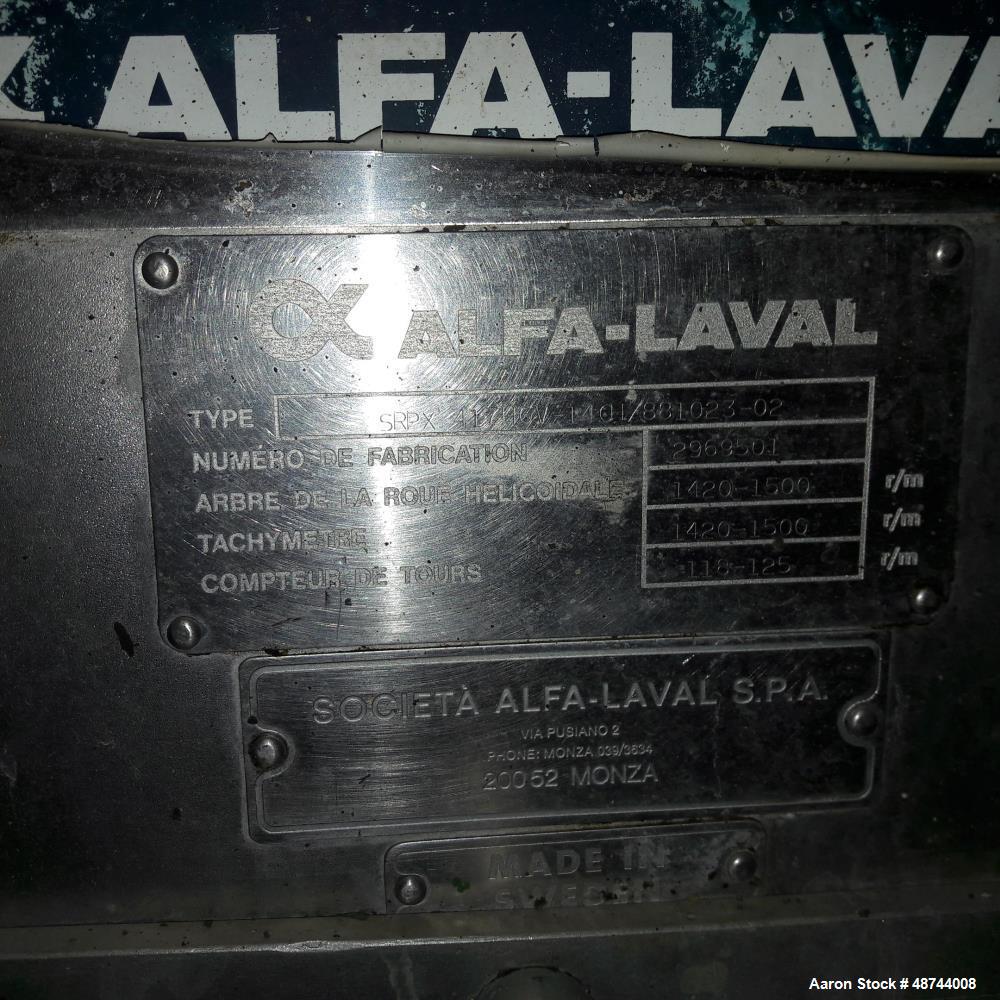 Used Alfa Laval SRPX-417 HGV-14CH Desludger Disc Centrifuge. 316 Stainless steel construction (product contact areas), separator design liquid/liquid/solids. Bottom feed design, flange drive motor, 1...
