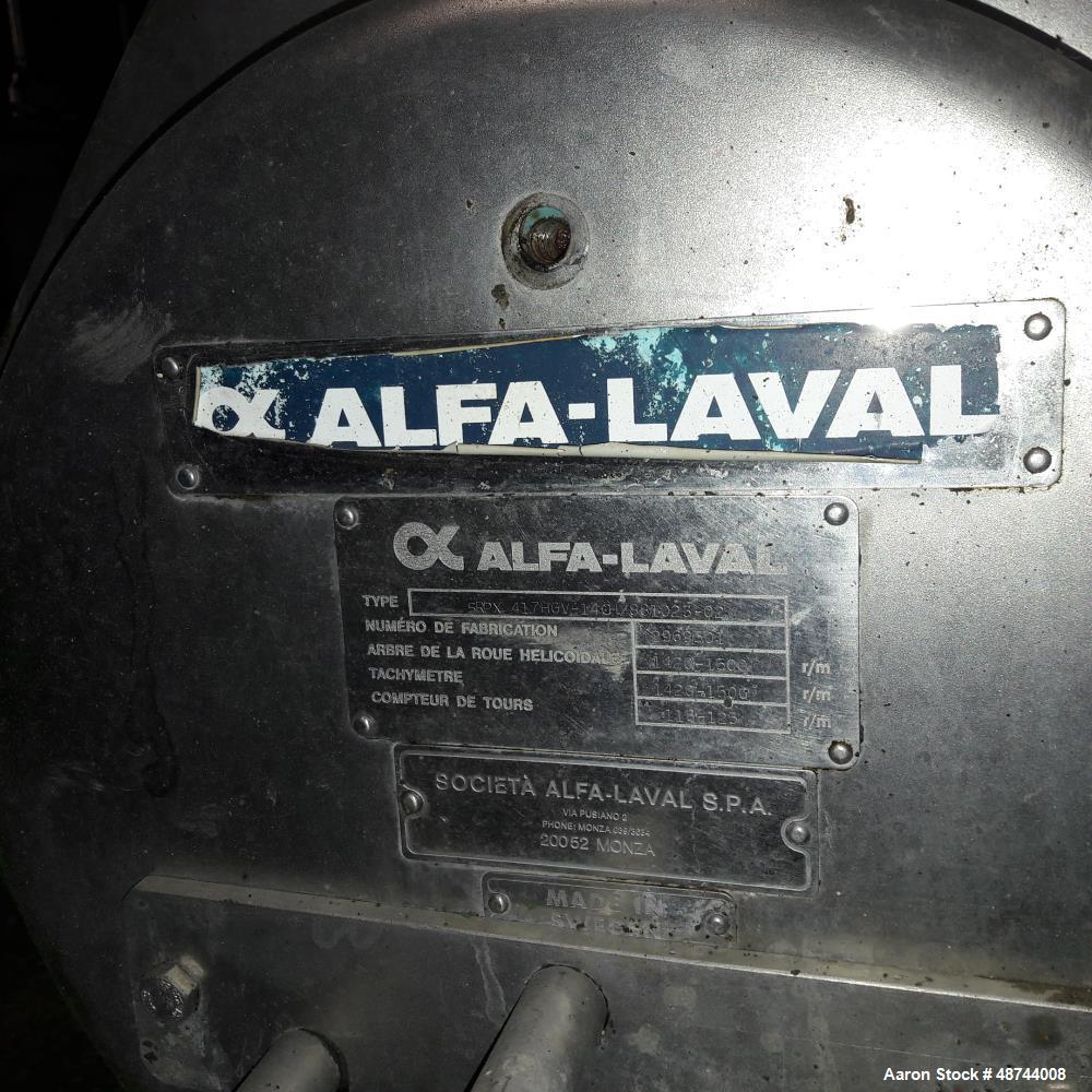 Used Alfa Laval SRPX-417 HGV-14CH Desludger Disc Centrifuge. 316 Stainless steel construction (product contact areas), separator design liquid/liquid/solids. Bottom feed design, flange drive motor, 1...