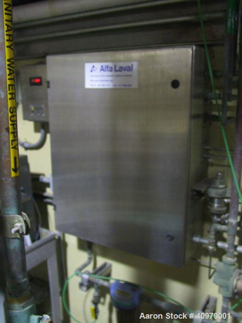 Used Alfa Laval VNPX-510 Desludger Disc Centrifuge. Stainless steel construction on product contact areas, clarifier design, centripetal pump liquid discharge, timed solids discharge, water harness, ...