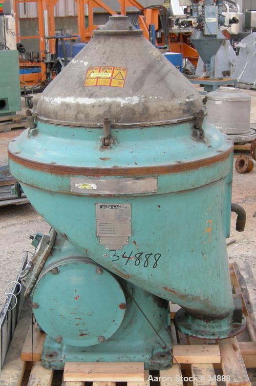 USED: Alfa-Laval WSPX-213-TGT-74G desludger centrifuge, 316 stainless steel. 3 phase separator, deep cover design. Driven by a 15 kw direct drive, 3/50/415 volt, 1450 rpm motor. Missing top piping. B...