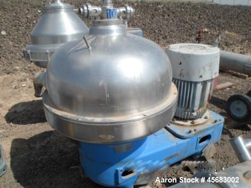 Used Westfalia SA-100 Desludger Disc Centrifuge. 316 Stainless steel construction (product contact areas). Separator design (liquid/liquid/solids separation). Centripetal pump and gravity overflow li...