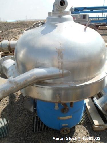 Used Westfalia SA-100 Desludger Disc Centrifuge. 316 Stainless steel construction (product contact areas). Separator design (liquid/liquid/solids separation). Centripetal pump and gravity overflow li...