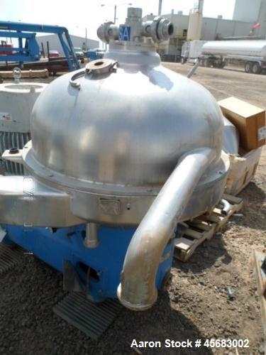 Used Westfalia SA-100 Desludger Disc Centrifuge. 316 Stainless steel construction (product contact areas). Separator design (liquid/liquid/solids separation). Centripetal pump and gravity overflow li...
