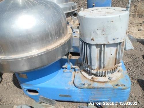 Used Westfalia SA-100 Desludger Disc Centrifuge. 316 Stainless steel construction (product contact areas). Separator design (liquid/liquid/solids separation). Centripetal pump and gravity overflow li...