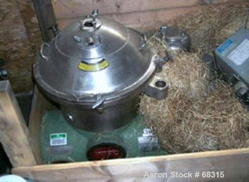 Used Westfalia Desludger/Separator Disc Centrifuge, Model SA14-01-076316, Stainless Steel. 7560 RPM maximum bowl speed. Complete with a direct connected 10 hp 208-230/460 volt motor.